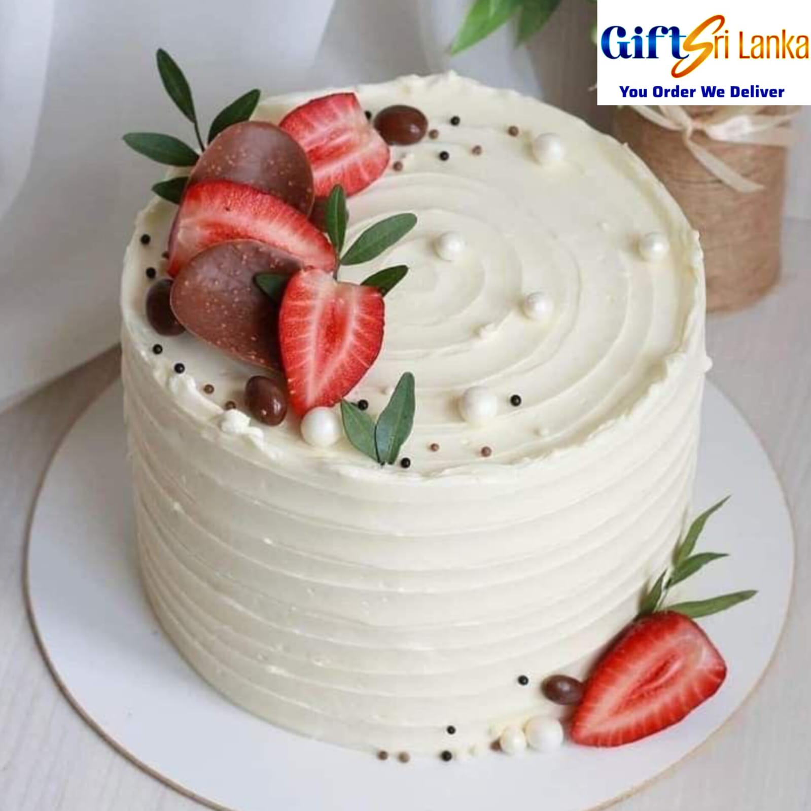Elegant White Swirl Cake with Strawberries & Chocolate Truffles – 1kg