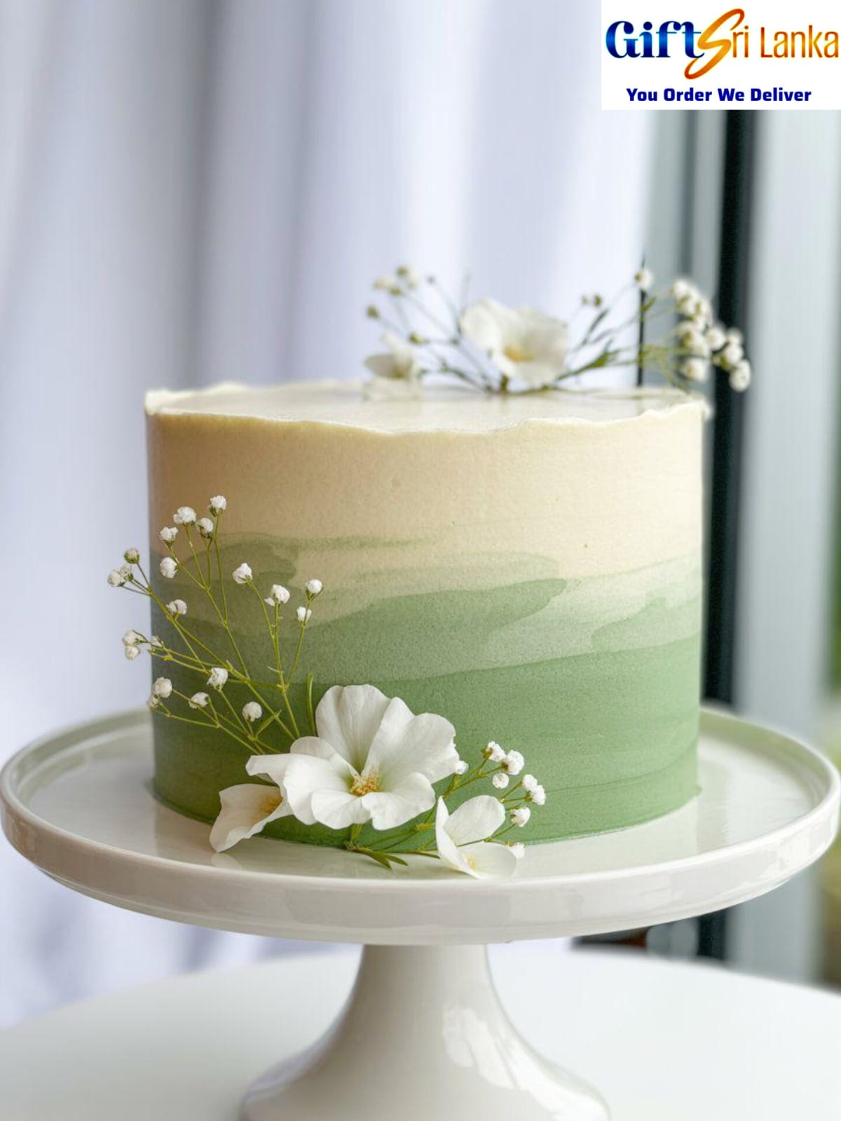 Elegant Green-to-Cream Ombre Cake with Fresh White Flowers – 1kg